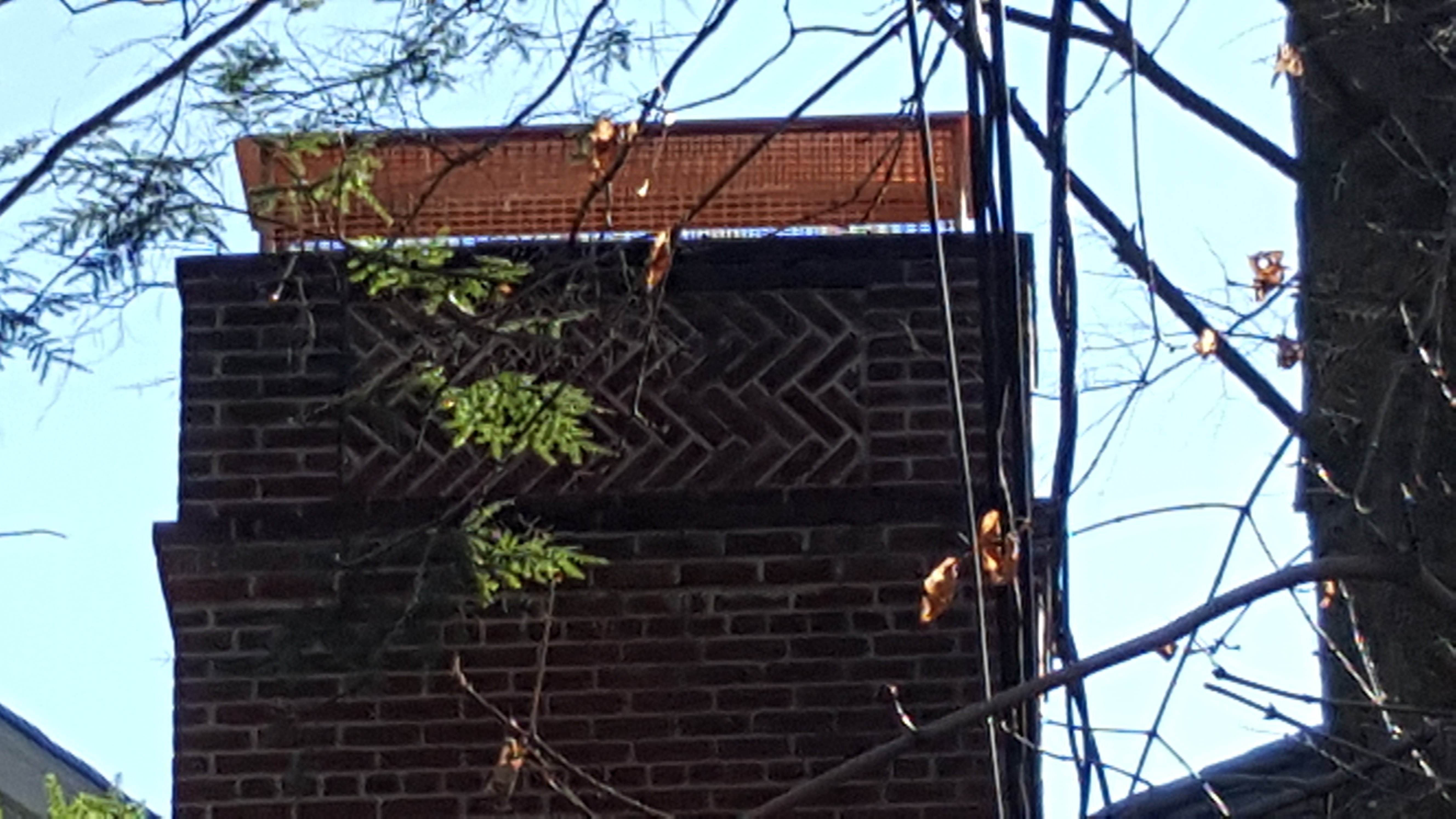 Waterproofed brick chimney with beaded water