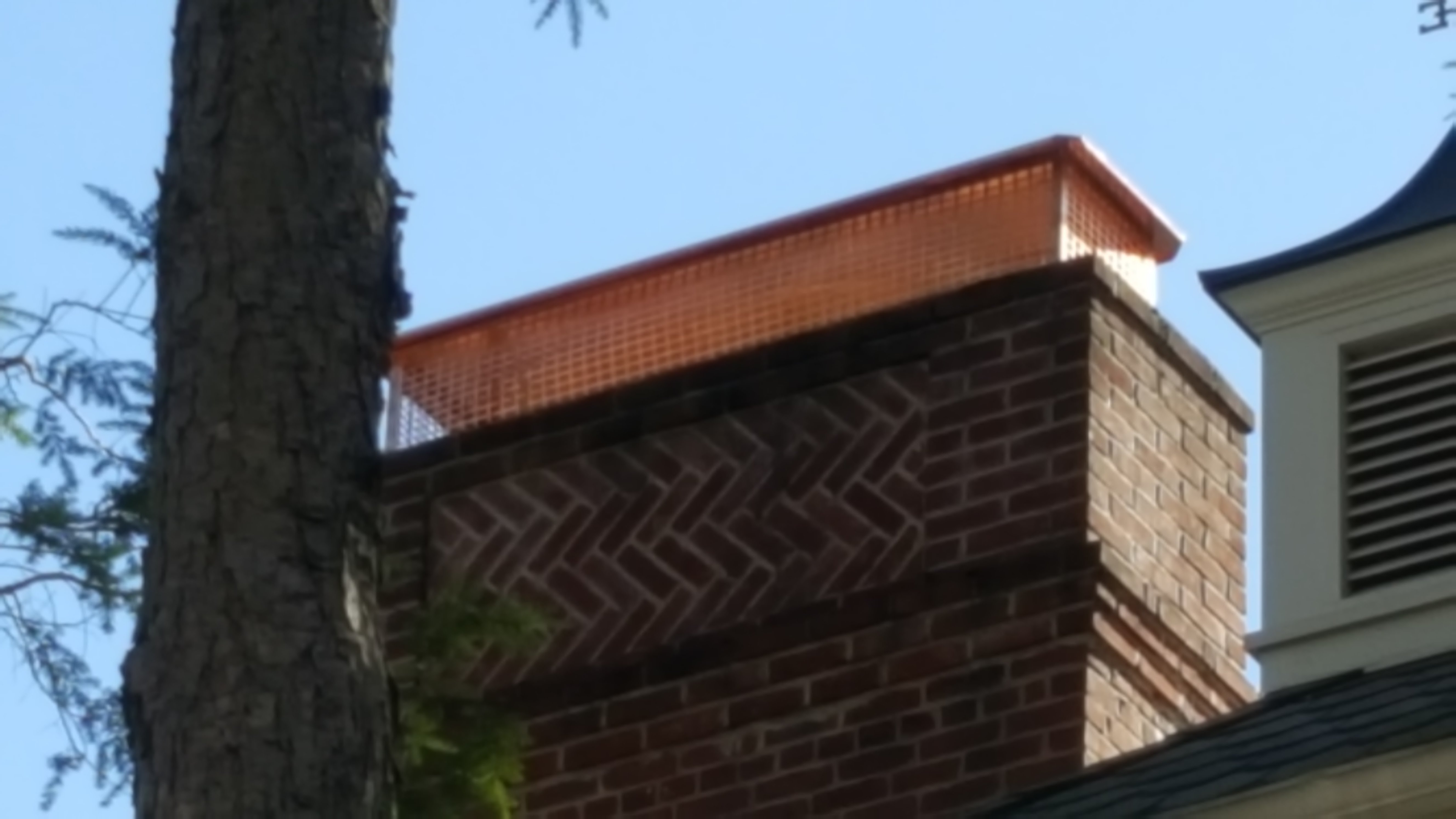 Technician spraying waterproofing product